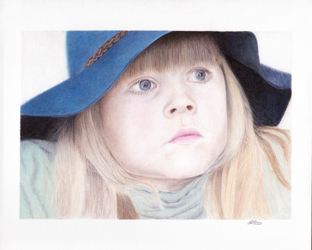 Girl in a blue hat